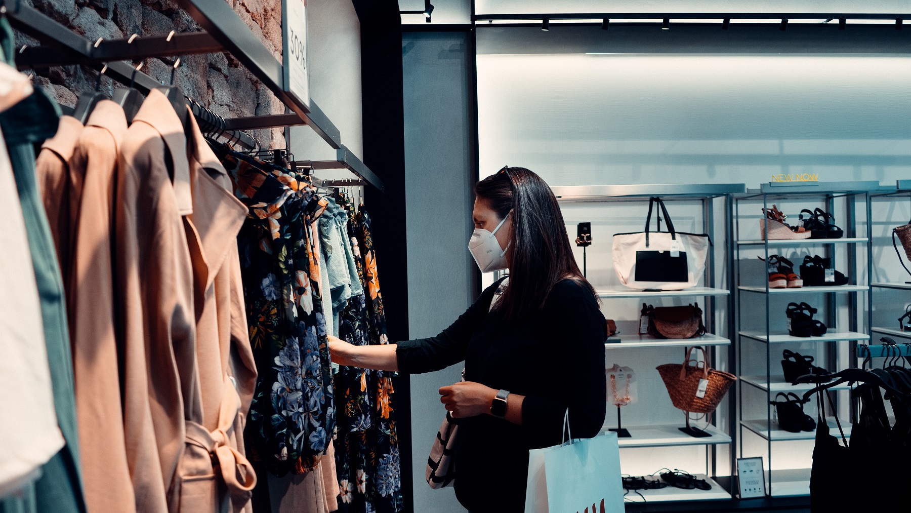 Woman-sorting-through-clothes