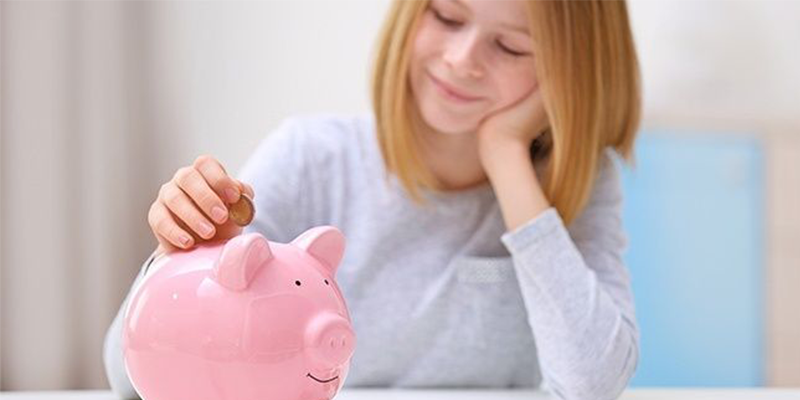 teen with piggy bank