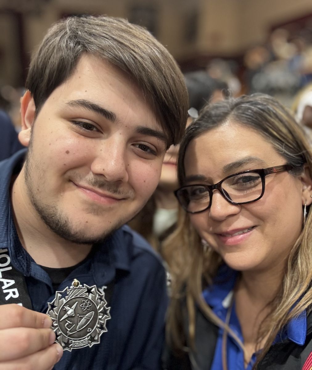 AFCU member and associate Angie with her son