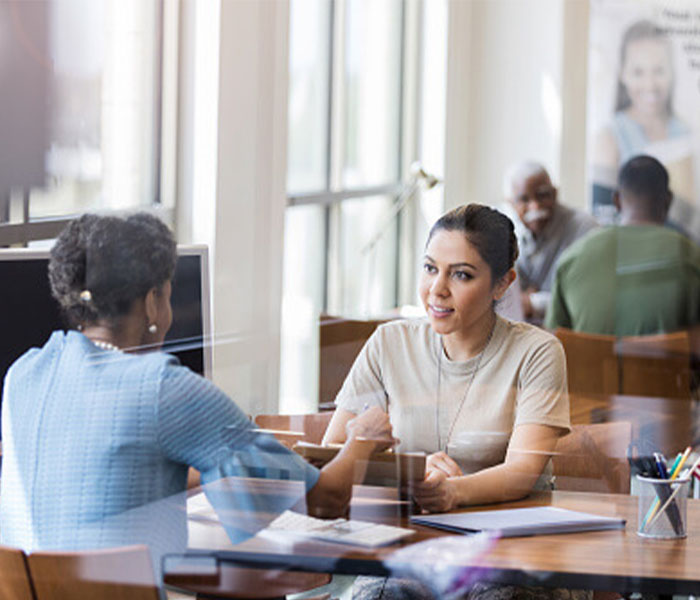 Woman meeting with someone in a bank