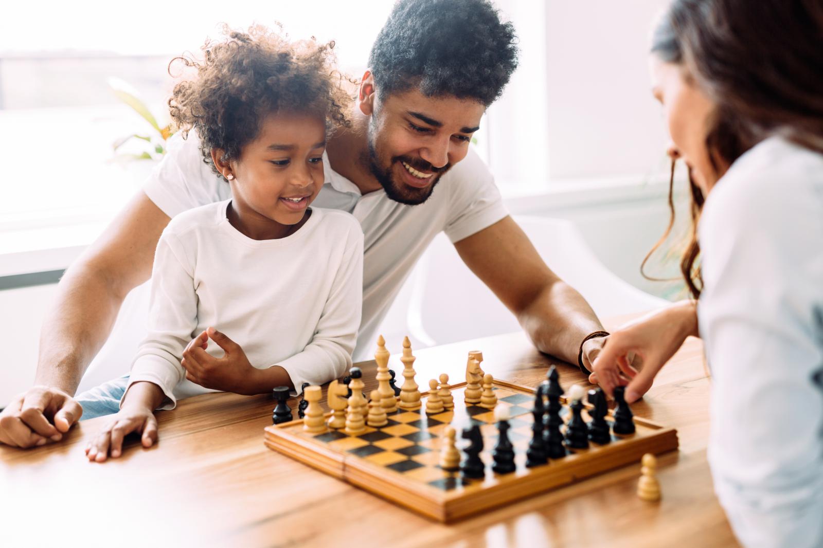 Family in living room playing games