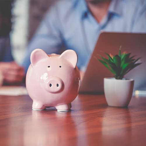 piggy bank sitting on desk